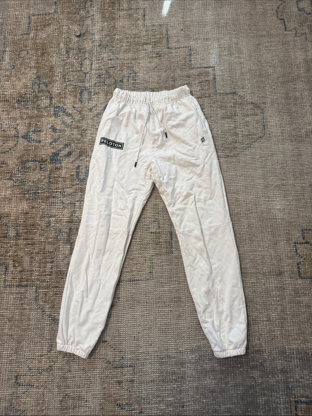 Peloton White Logo Jogger Pants with rainbow stripe